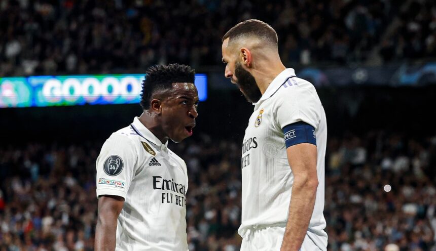 Vinícius Júnior e Karim Benzema após o primeiro gol